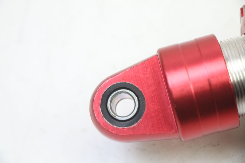 photo de AMMORTIZZATORE POSTERIORE LONCIN DIRT BIKE 125 - Zoom sullo stato d'uso