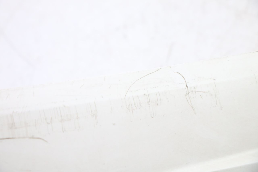 photo de BASSO DELLA SCATOLA SINISTRA SYM FIDDLE 3 III 125 (2014 - 2020) - Primo piano tecnico