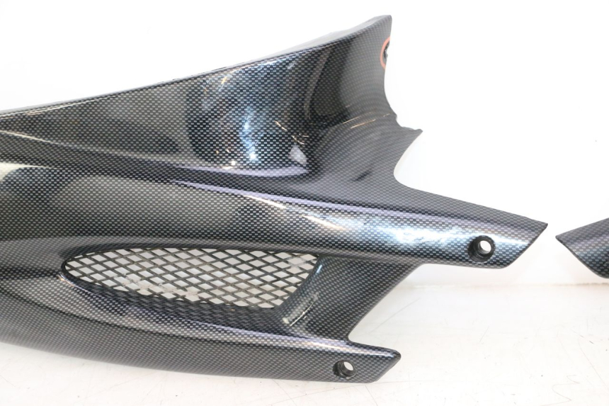 photo de COPERCHIO SOTTO SELLA PEUGEOT SPEEDFIGHT LC 50 (1996 - 2002) - Caratteristiche distintive