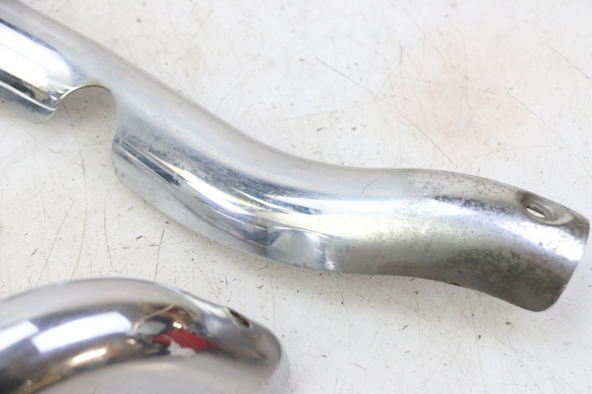 photo de COPERCHIO DI SCARICO HYOSUNG GV AQUILA 125 (2000 - 2009) - Stato della superficie e materiale