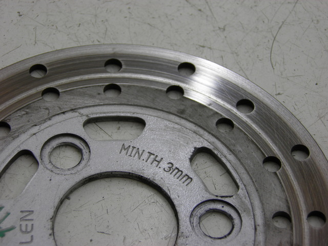 photo de DISCO FRENO ANTERIORE QINGQI SPEEDY 50 (2005 - 2007) - Zoom sullo stato d'uso