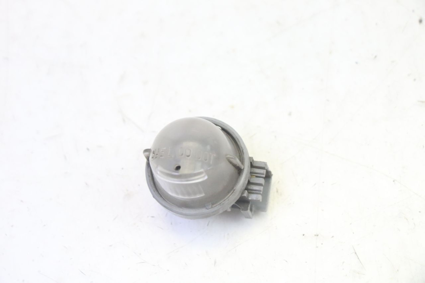 photo de ILLUMINAZIONE TARGA SUZUKI BURGMAN 125 (2007 - 2014) - Zoom sullo stato d'uso