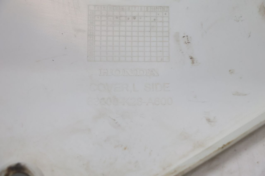 photo de CARENA POSTERIORE SINISTRA HONDA CRF CR-F 125 (2020 - 2021) - Stato della superficie e materiale