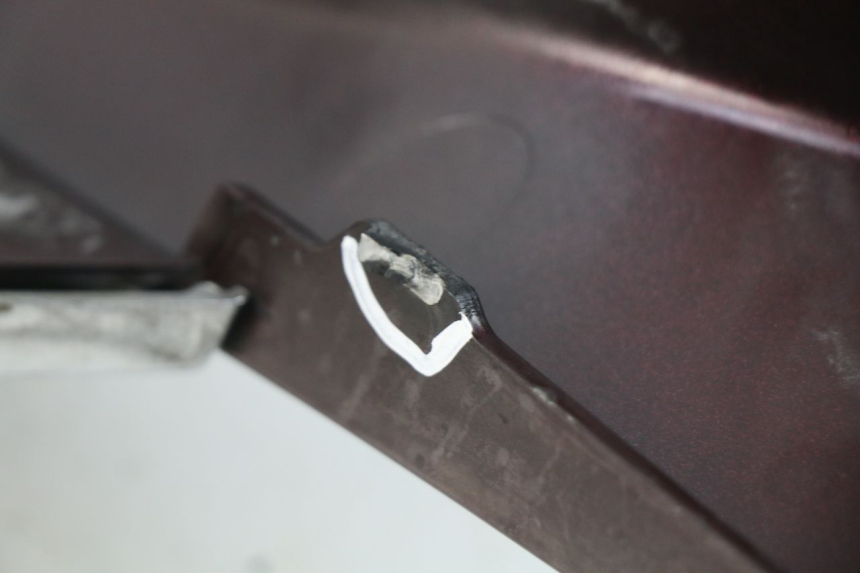 photo de PARAFANGO POSTERIORE SINISTRO PIAGGIO X8 125 (2004 - 2007) - Zoom sullo stato d'uso