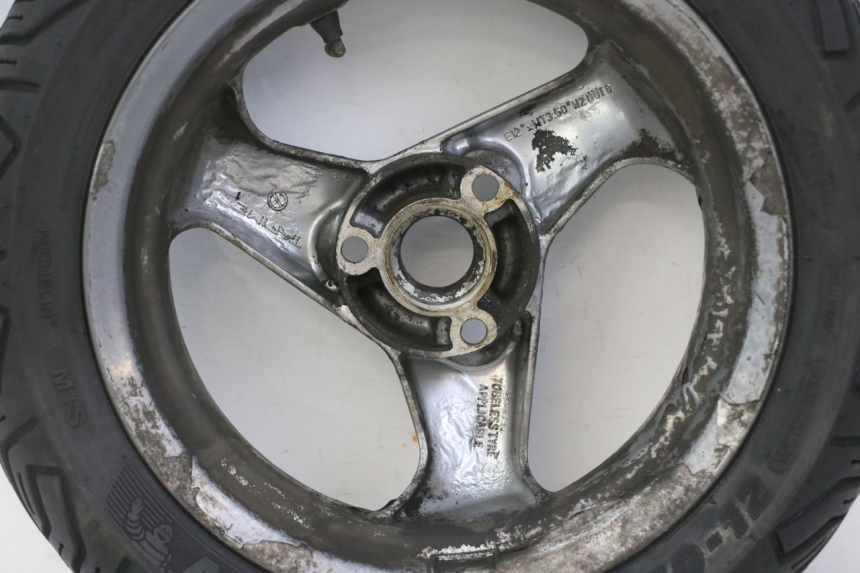 photo de CERCHIO POSTERIORE E PNEUMATICO PEUGEOT ELYSTAR 125 (2002 - 2007) - Ispezione visiva dettagliata