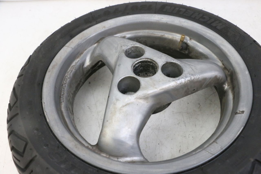 photo de CERCHIO POSTERIORE E PNEUMATICO PEUGEOT ELYSTAR 125 (2002 - 2007) - Altra angolazione