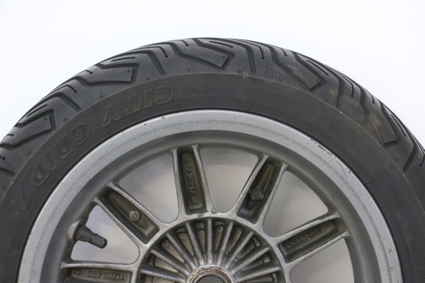 photo de CERCHIO POSTERIORE E PNEUMATICO PIAGGIO MP3 125 (2006 - 2014) - Marcature e riferimenti originali