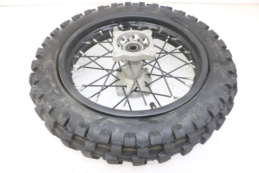 photo de CERCHIO POSTERIORE E PNEUMATICO APOLLO RXF 125 - Stato della superficie e materiale