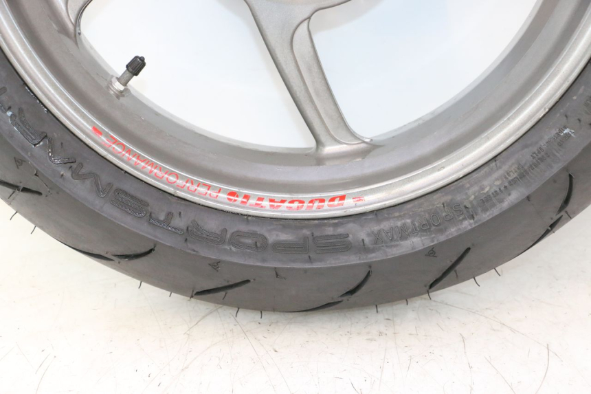 photo de CERCHIO POSTERIORE E PNEUMATICO DUCATI SS IE DS CARENEE 1000 (2002 - 2006) - Marcature e riferimenti originali