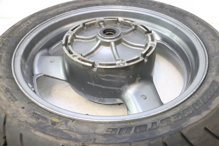 photo de CERCHIO POSTERIORE E PNEUMATICO HONDA ST PAN EUROPEAN 1100 (1990 - 2002) - Marcature e riferimenti originali