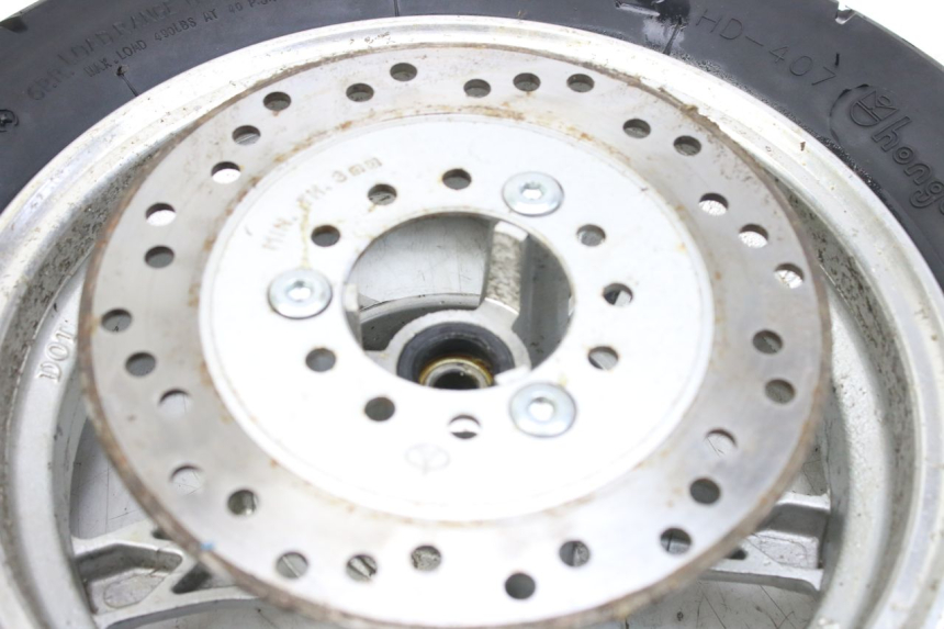 photo de CERCHIO ANTERIORE WILDLANDER BISCUIT 125 (2004 - 2010) - Stato della superficie e materiale