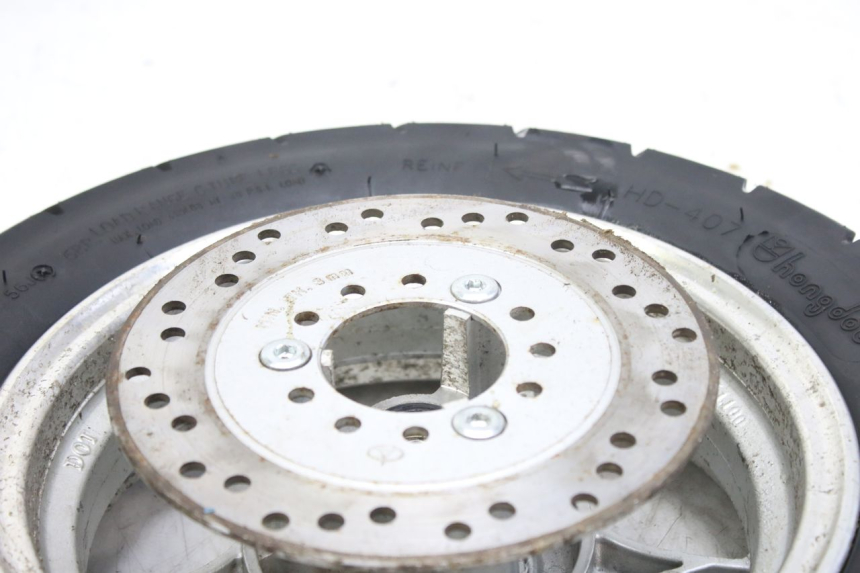 photo de CERCHIO ANTERIORE WILDLANDER BISCUIT 125 (2004 - 2010) - Marcature e riferimenti originali