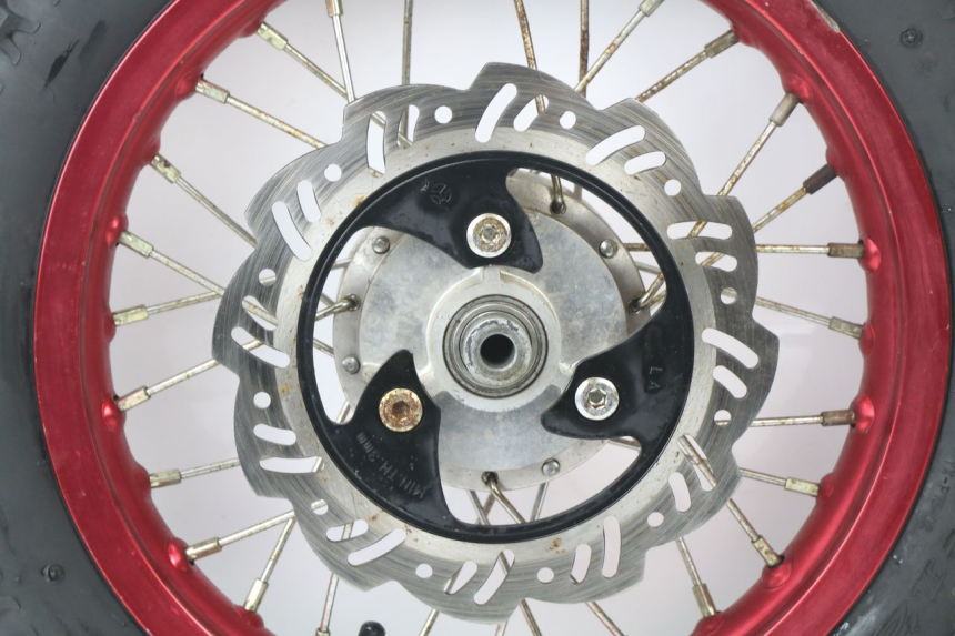 photo de CERCHIO ANTERIORE THUMP DIRT BIKE 120 - Ispezione visiva dettagliata