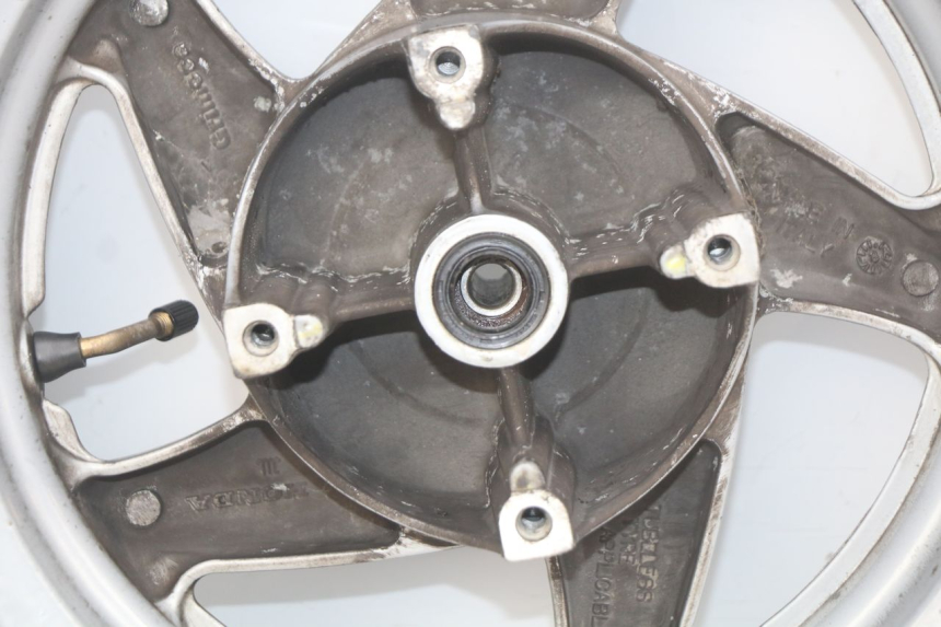 photo de CERCHIO ANTERIORE HONDA FES PANTHEON 2T 125 (1998 - 2002) - Marcature e riferimenti originali