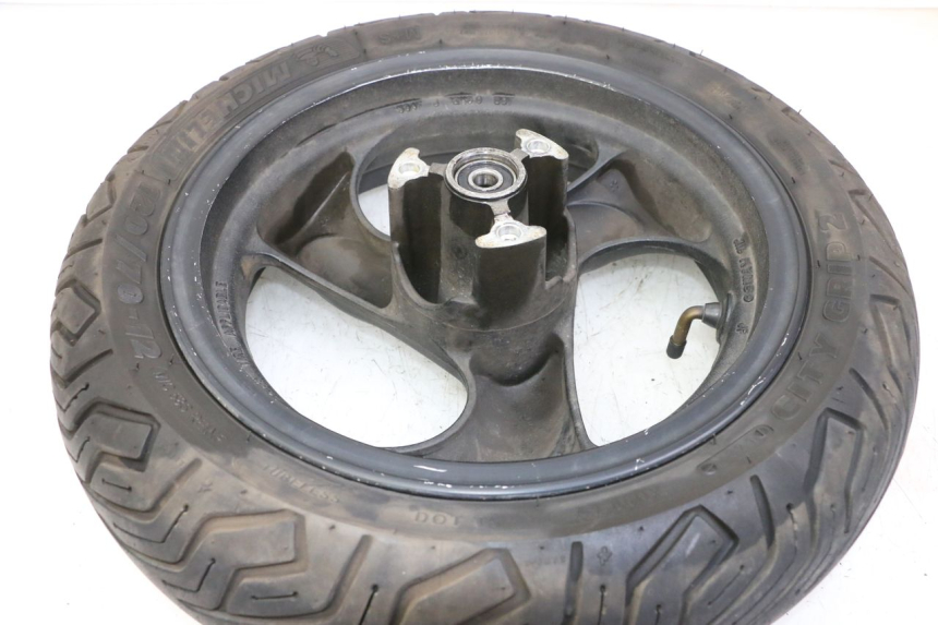 photo de CERCHIO ANTERIORE E PNEUMATICO KYMCO AGILITY 4T 50 (2005 - 2018) - Altra angolazione