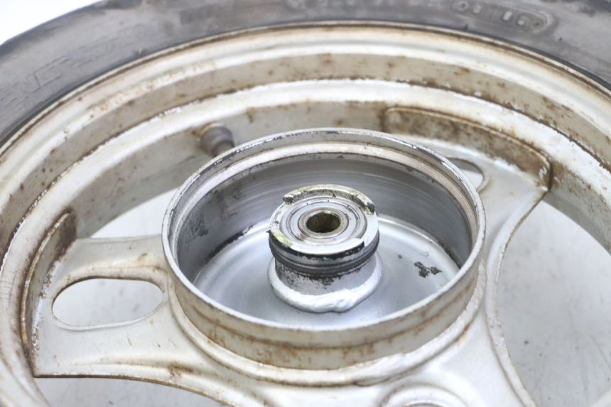 photo de CERCHIO ANTERIORE E PNEUMATICO PEUGEOT LUDIX ONE 50 (2005 - 2008) - Altra angolazione