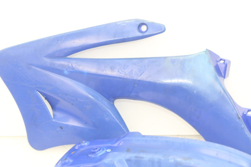 photo de GIUNZIONE CARENA ANTERIORE LONCIN DIRT BIKE 125 - Stato della superficie e materiale