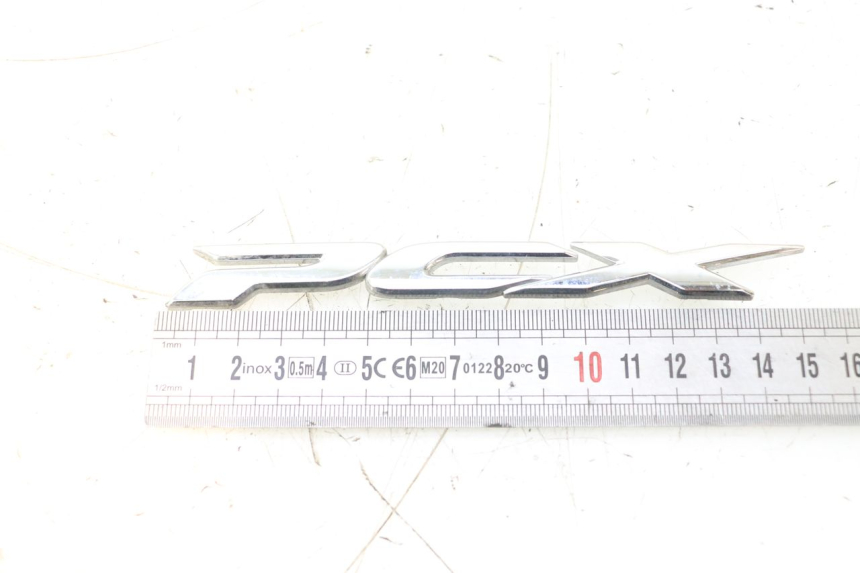 photo de LOGO MARCHIO HONDA PCX (JF28) 125 (2009 - 2011) - Dettaglio del componente