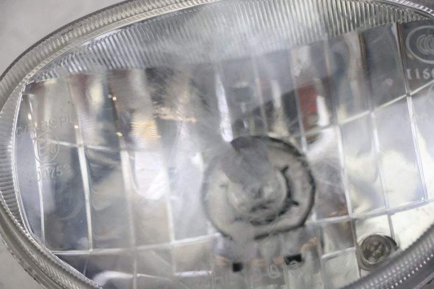 photo de FARO ANTERIORE DAELIM BESBI 125 (2007 - 2008) - Zoom sui componenti