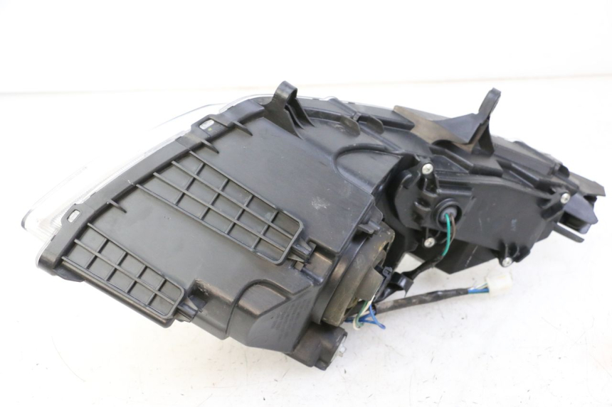 photo de FARO ANTERIORE DESTRA SYM JOYMAX 125 (2010 - 2017) - Marcature e riferimenti originali