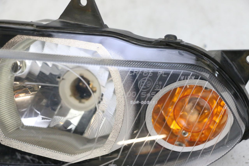 photo de FARO ANTERIORE SINISTRA YAMAHA TZR 50 (2008 - 2016) - Stato della superficie e materiale