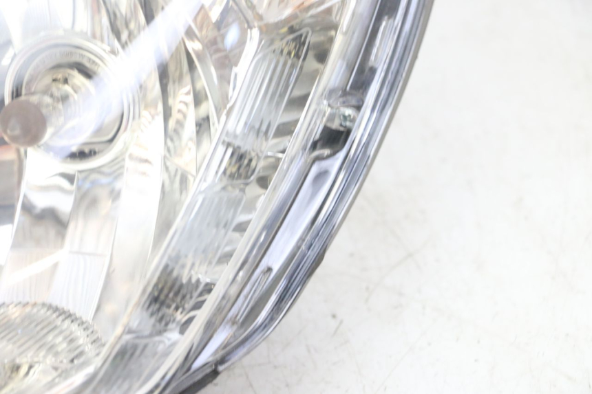 photo de FARO ANTERIORE PEUGEOT SATELIS 125 (2013 - 2018) - Stato della superficie e materiale